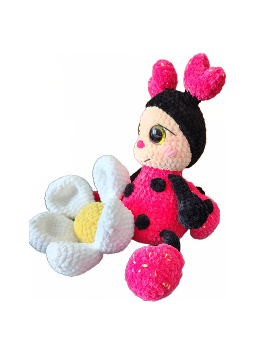 Crocheted ladybug and flower