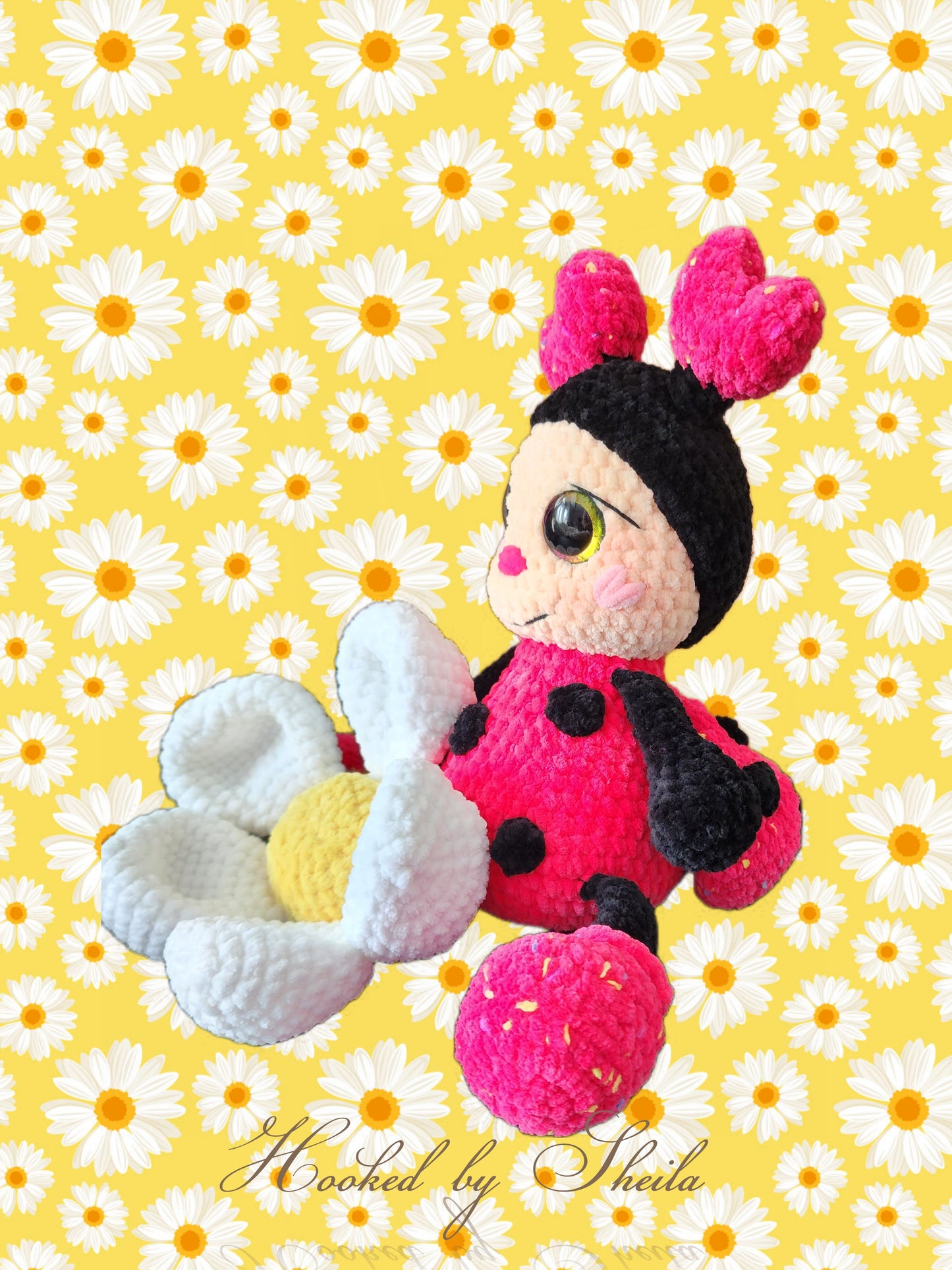 Crocheted ladybug and flower