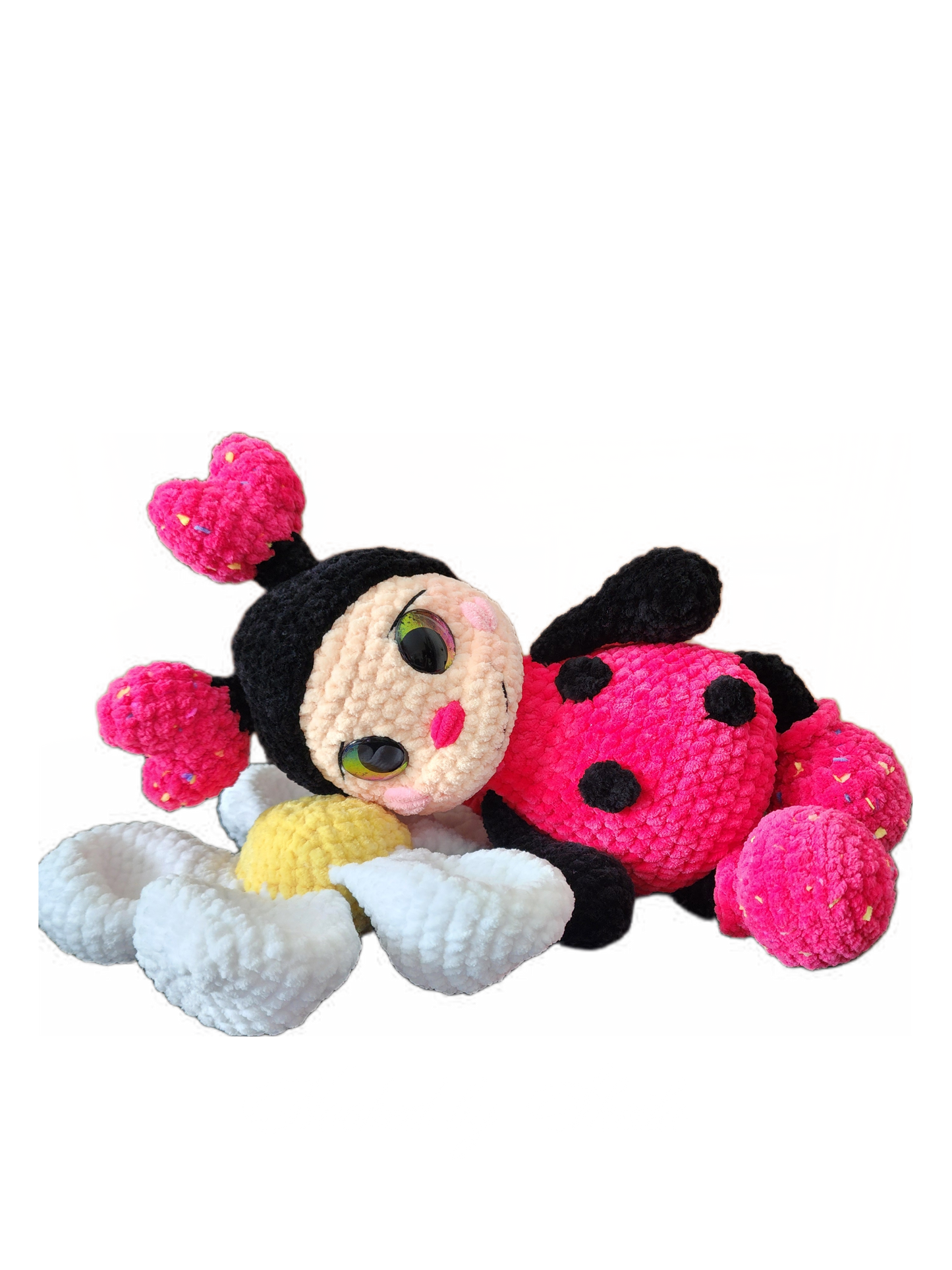 Crocheted ladybug and flower